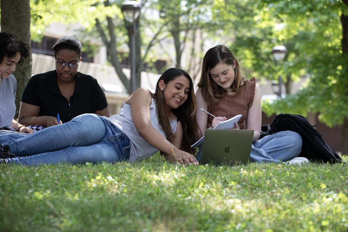 Raritan Valley Community College Photo #1 - Students working on a project out on the courtyard lawn