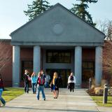 Pierce College District Photo - Students gather outside the Gaspard Building on the Puyallup Campus.