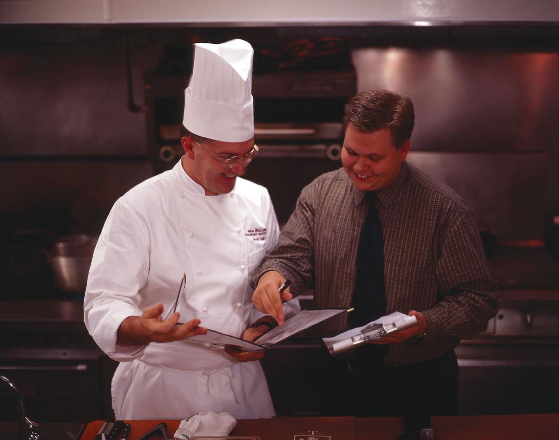 New England Culinary Institute Photo #1 - Reviewing the menu with the chef before service.